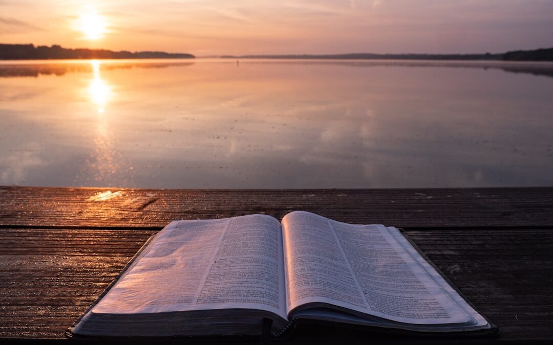 Bible verses about sobriety - peaceful morning sunrise with open Bible