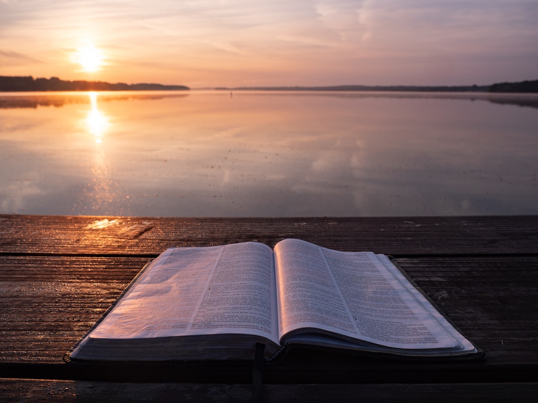Bible verses about sobriety - peaceful morning sunrise with open Bible